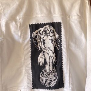 Old Navy size L women’s jean jacket, studded and patched.